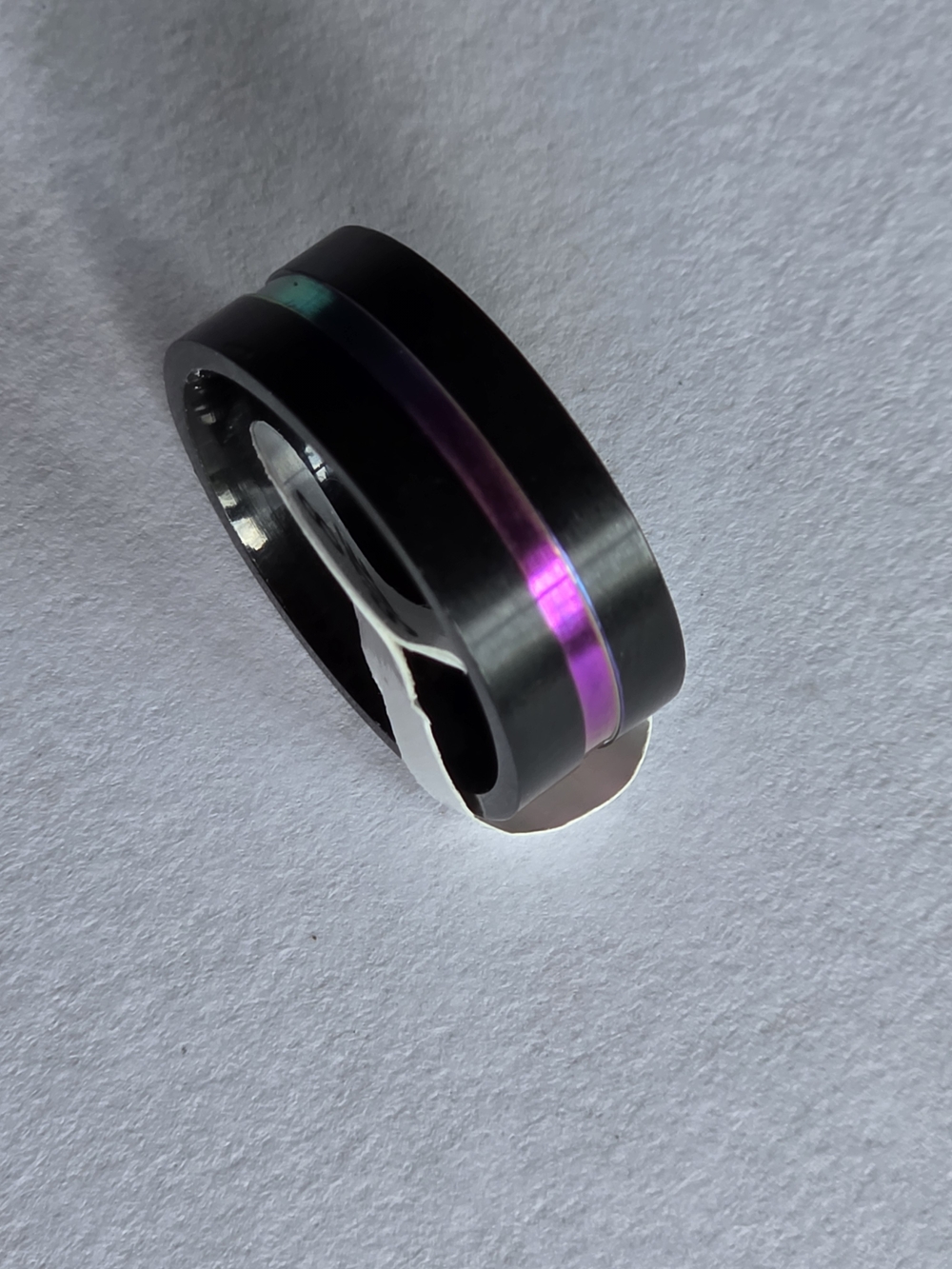 Black Ring with Iridescent Purple Accent